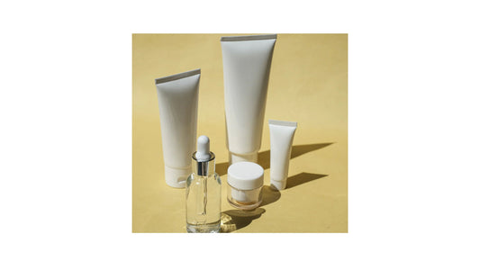 Indigo Private Label skincare sample kit with serum bottle, cream jar, and tube packaging for private label brands. 